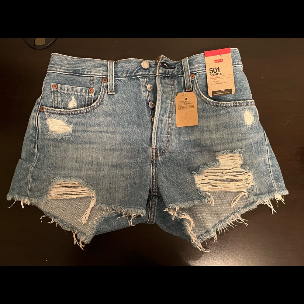Levi light wash ripped shorts